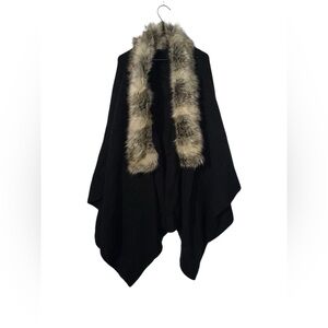 Women's Black ponchos & wraps